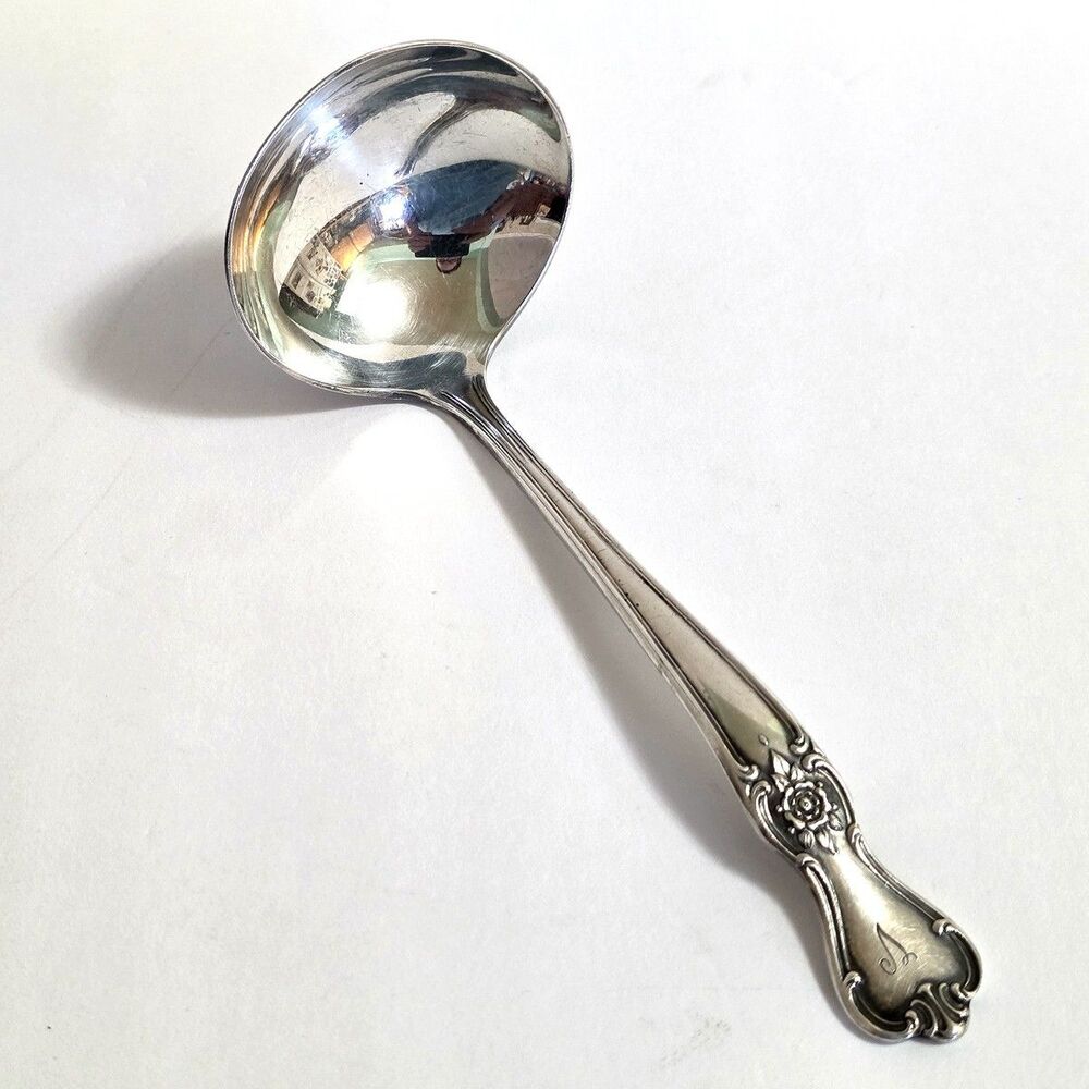 Old Company Silverplate Ladle monogram "V"